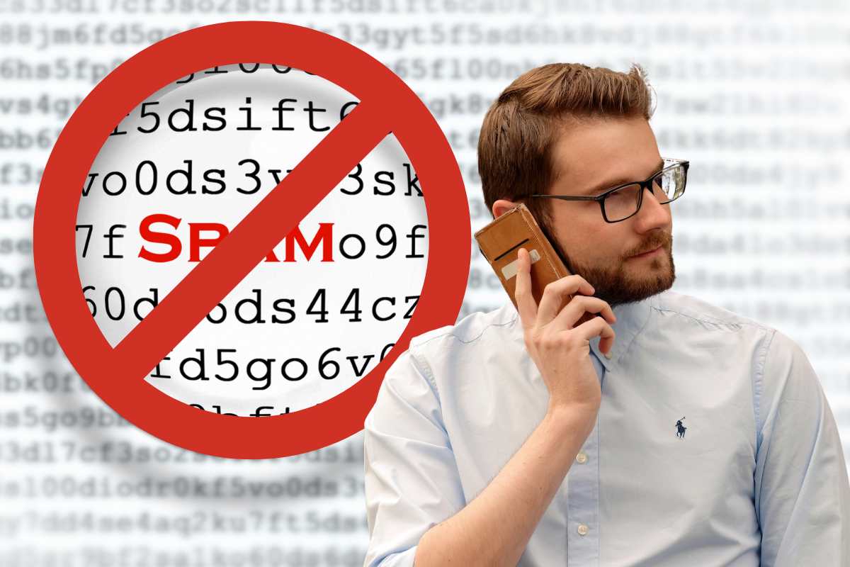 scritta spam coperta da un segnale di stop, ragazzo al telefono